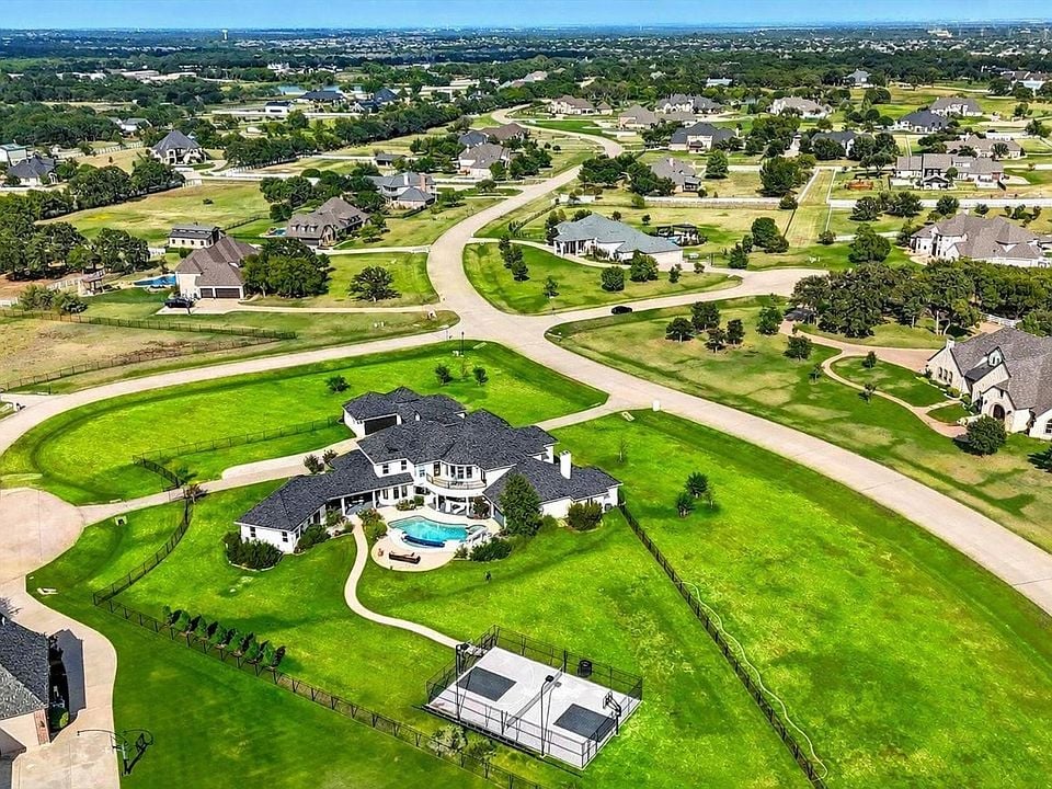 Luxury home with pool in Quiet Hill Estates Bartonville TX on large lot.