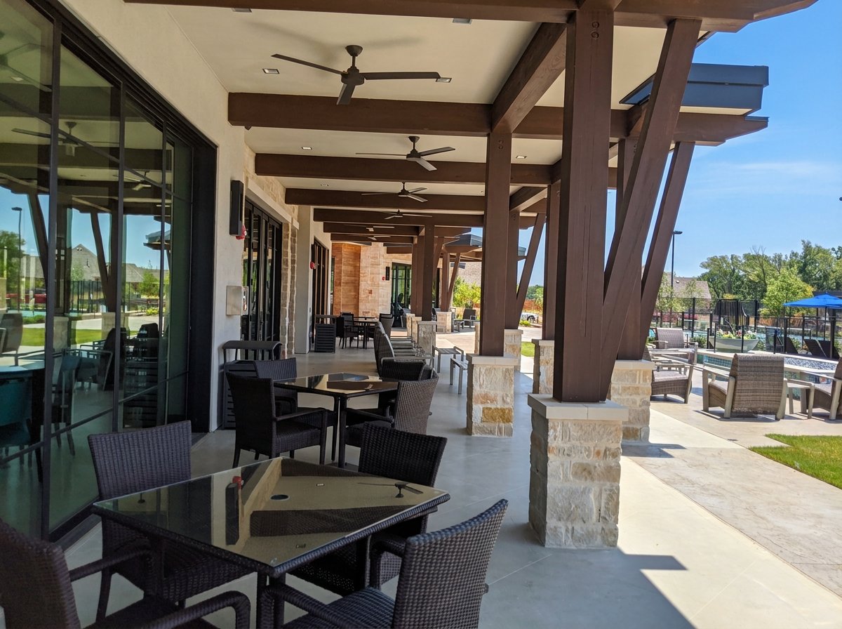 Outdoor Patio  at the  Magnolia Lifestyle Center reserved for the residents of the age restricted Elements at Viridian.