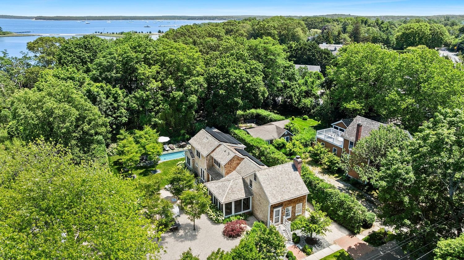 Modernized Vintage Cottage with Knockout Backyard, Moments to Village Main