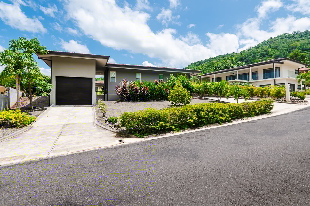 Casa Coralina | Elegant Home in Top Gated Community with Private Pool, Lush Gardens, & Incredible Amenities.  Located on a Double Lot w/ Ocean View!