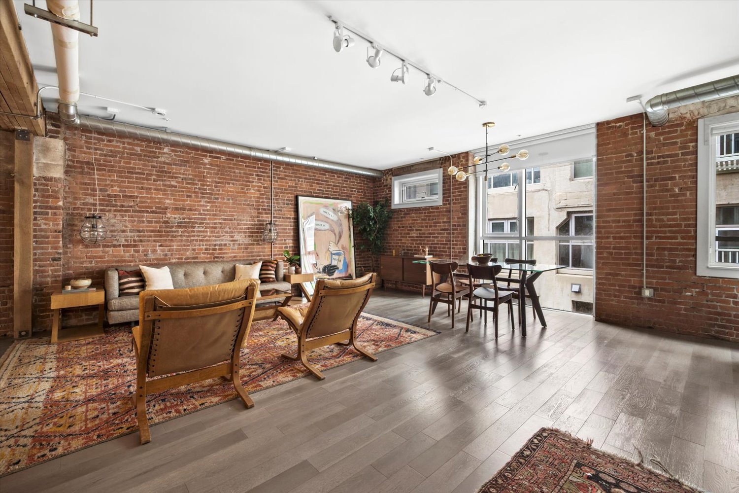 Breathtaking Exposed Brick & Beam Loft at THE BARKER BLOCK