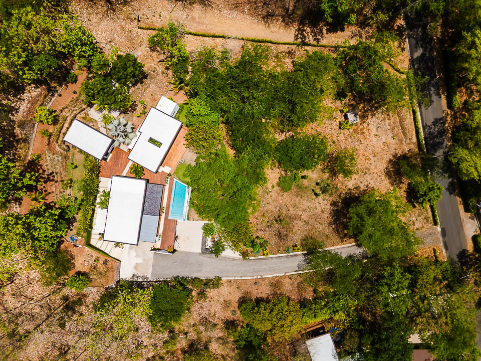 Casa Kalachuchi | Gorgeous Modern Jungle Oasis with Sunset Views in Gated Community