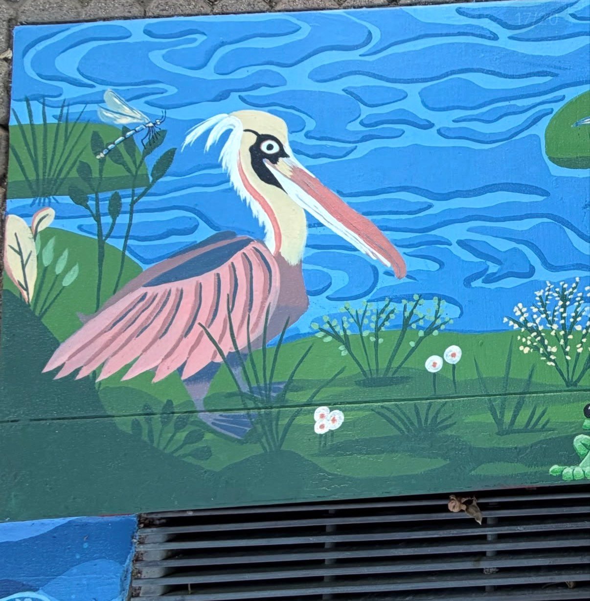 Pelican and heron storm drain mural on Cross Creek Road in Central Malibu