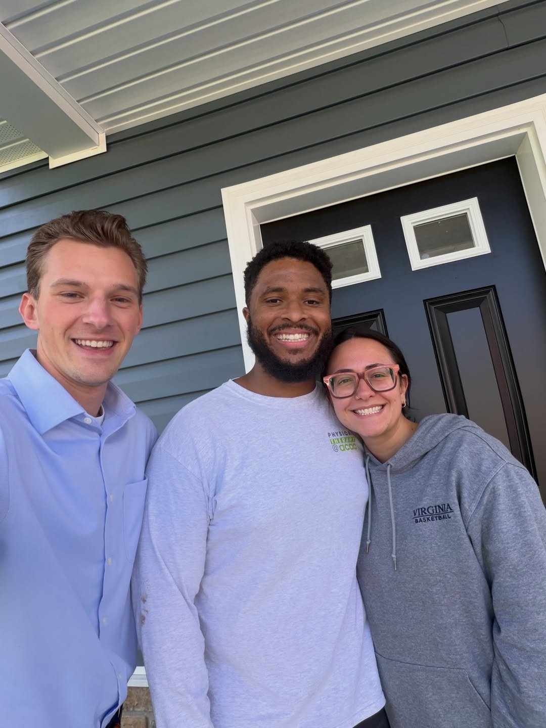 Aaron Mayersky with Terius and Courtney at the front door of their Pennsylvania home
