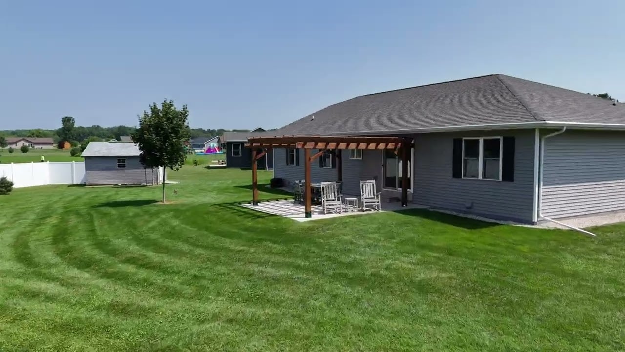 Charming Modern Ranch in Omro, WI | 4-Bed, 3-Bath Home with Pond Views & Pergola Patio