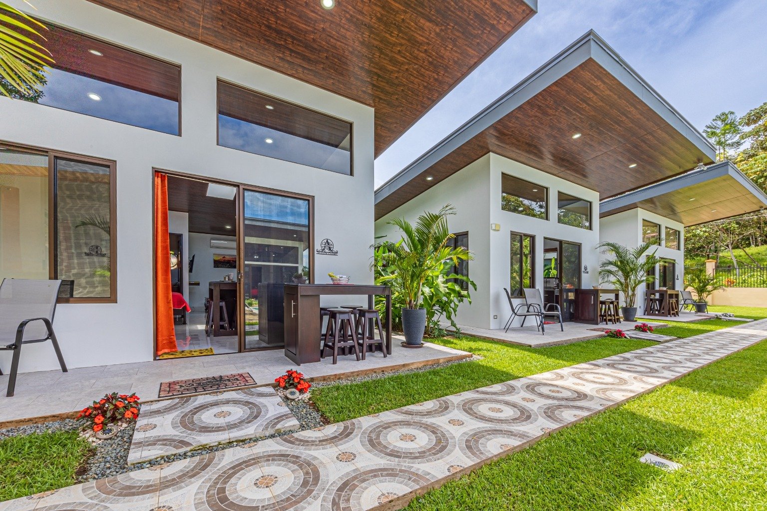 Incredible turnkey investment opportunity, 3 Rental villas, and a 2 Bedroom Home with a large pool.