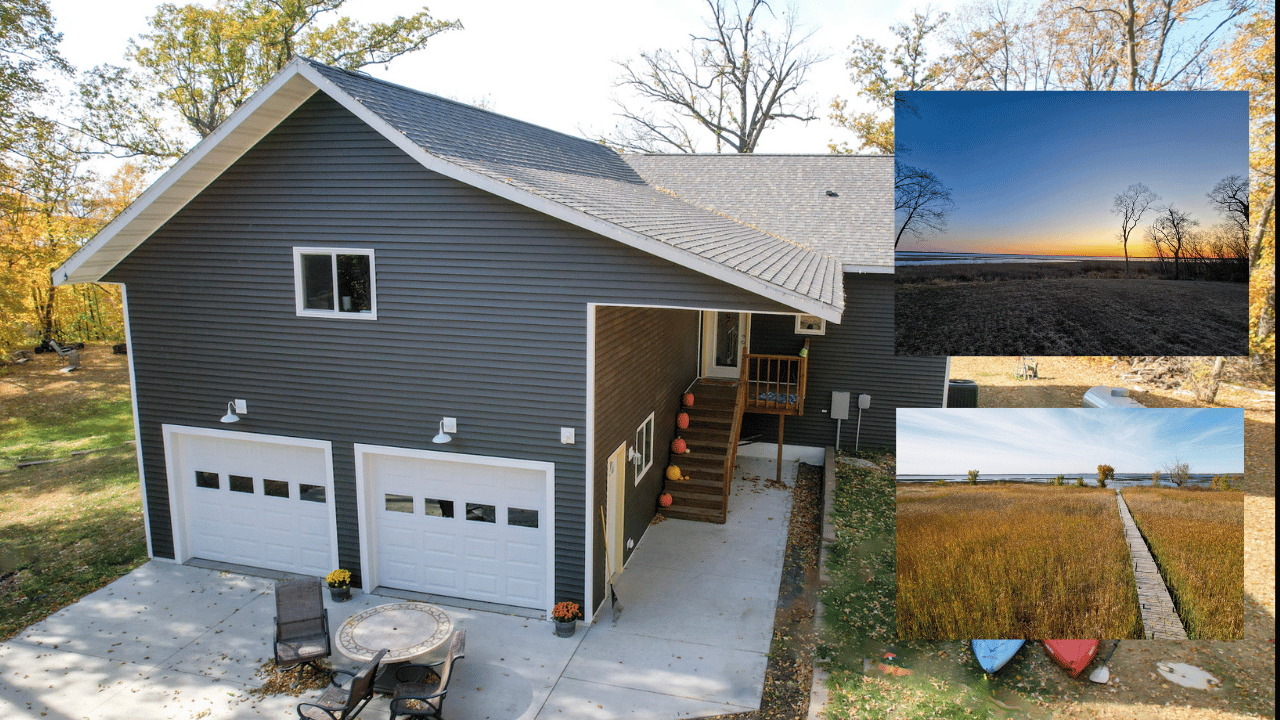Dark gray home with two garage doors and patio, alongside lake sunset and marsh boardwalk views.