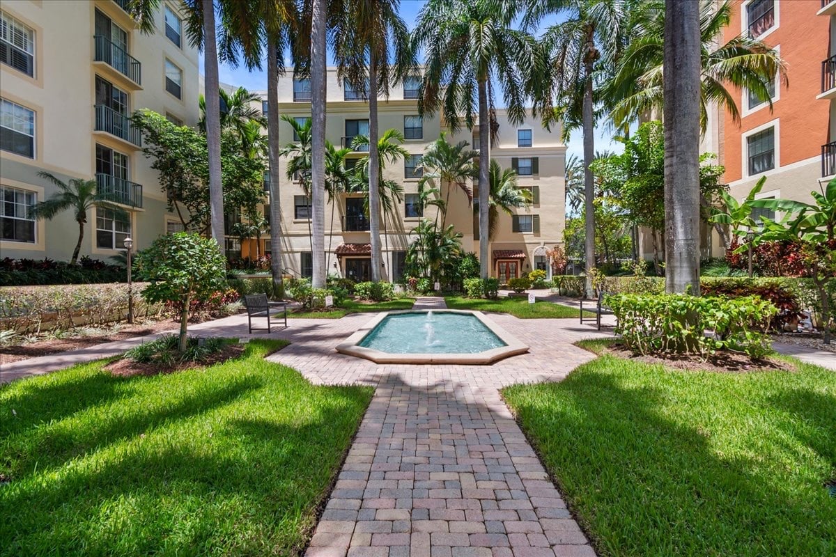 Pool view from a two-bedroom condo for sale at The Courtyards in CityPlace in downtown West Palm Beach, Florida