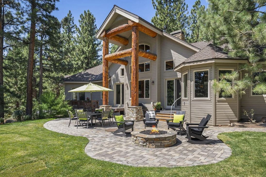 Stunning Galena Forest home on .86 acres. Beautiful curb appeal with long paver driveway, towering pines, Douglas Fir log and honey ledge stone accents, and redwood siding. The great room design has a wonderful ambience - like your own private lodge with 23 foot high ceiling, barrel vaulted with redwood, and log accents.