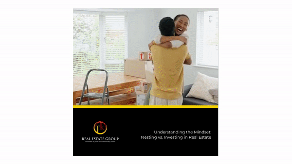 Happy couple hugging in their new home with moving boxes, illustrating the difference between nesting and real estate investing.