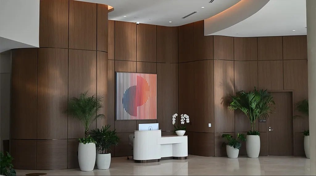 ONE Park Tower spa treatment room with a massage table and warm finishes.