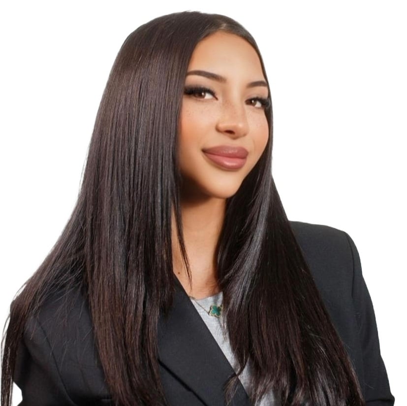 Karissa Kontos in a black blazer, with long, straight dark hair.