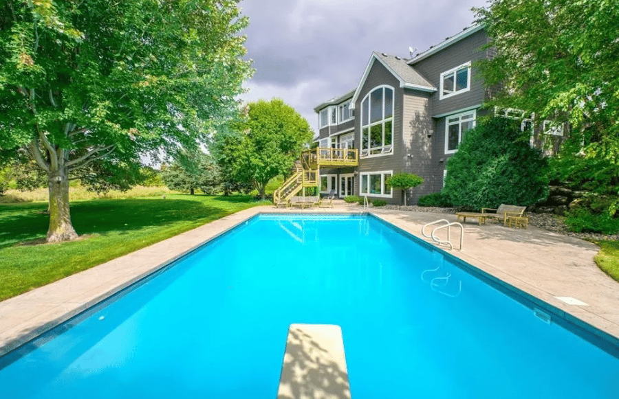 This Gurtek Custom Homes estate offers luxury, privacy, and an easy Twin Cities commute.