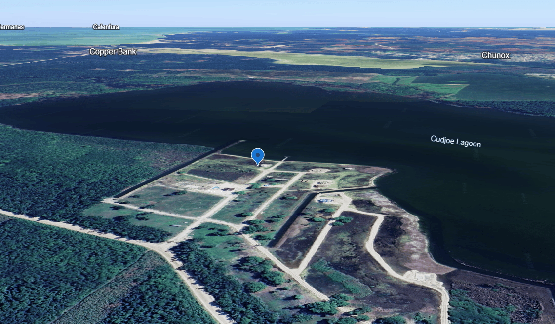 Vacant waterfront lot in a luxury master-planned gated residental community in northern Belize