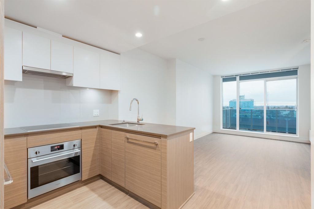 13615 Fraser Hwy, #402