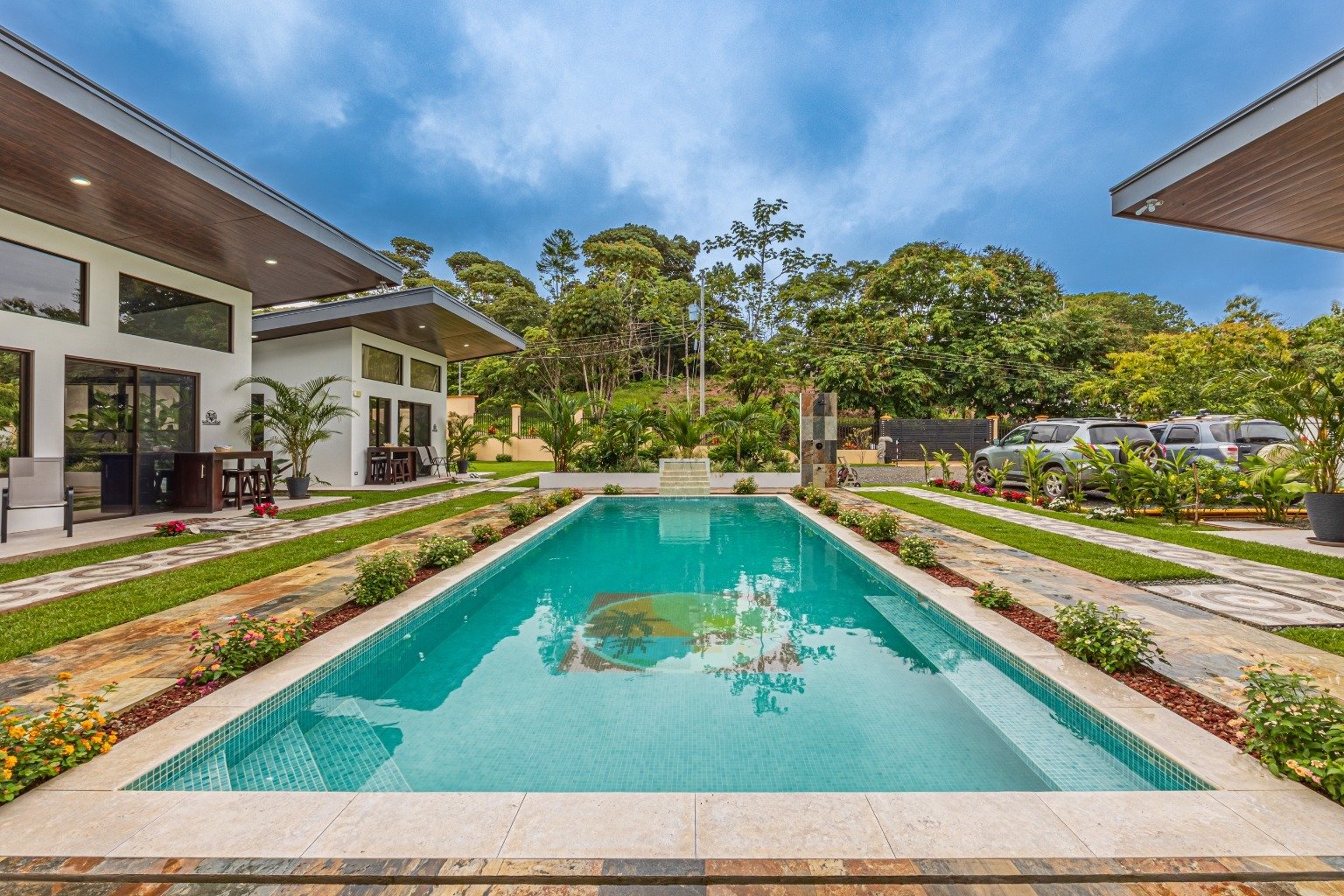 Incredible turnkey investment opportunity, 3 Rental villas, and a 2 Bedroom Home with a large pool.