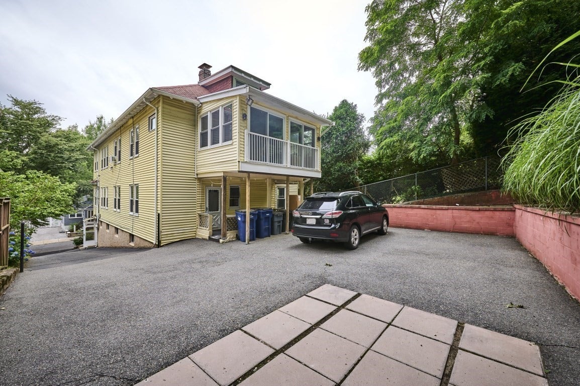 A Rare Two-Family Generational Asset with a Private Entrance to the Arnold Arboretum