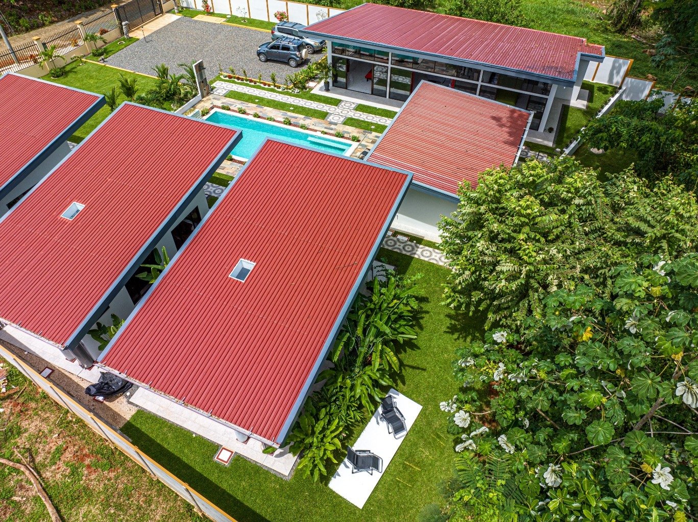 Incredible turnkey investment opportunity, 3 Rental villas, and a 2 Bedroom Home with a large pool.