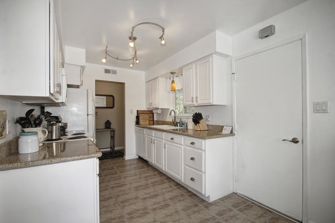 Just Listed in College Greens: 8645 Midfield Way