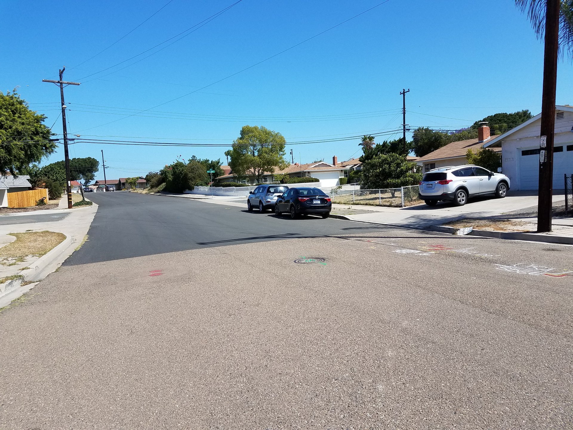 Residential street of single-story homes along the Lemon Grove and San Diego city line, photographed June 2018