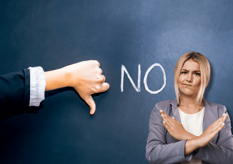 Blonde woman crosses her arms in an X beside a thumbs-down hand and the word “NO.”