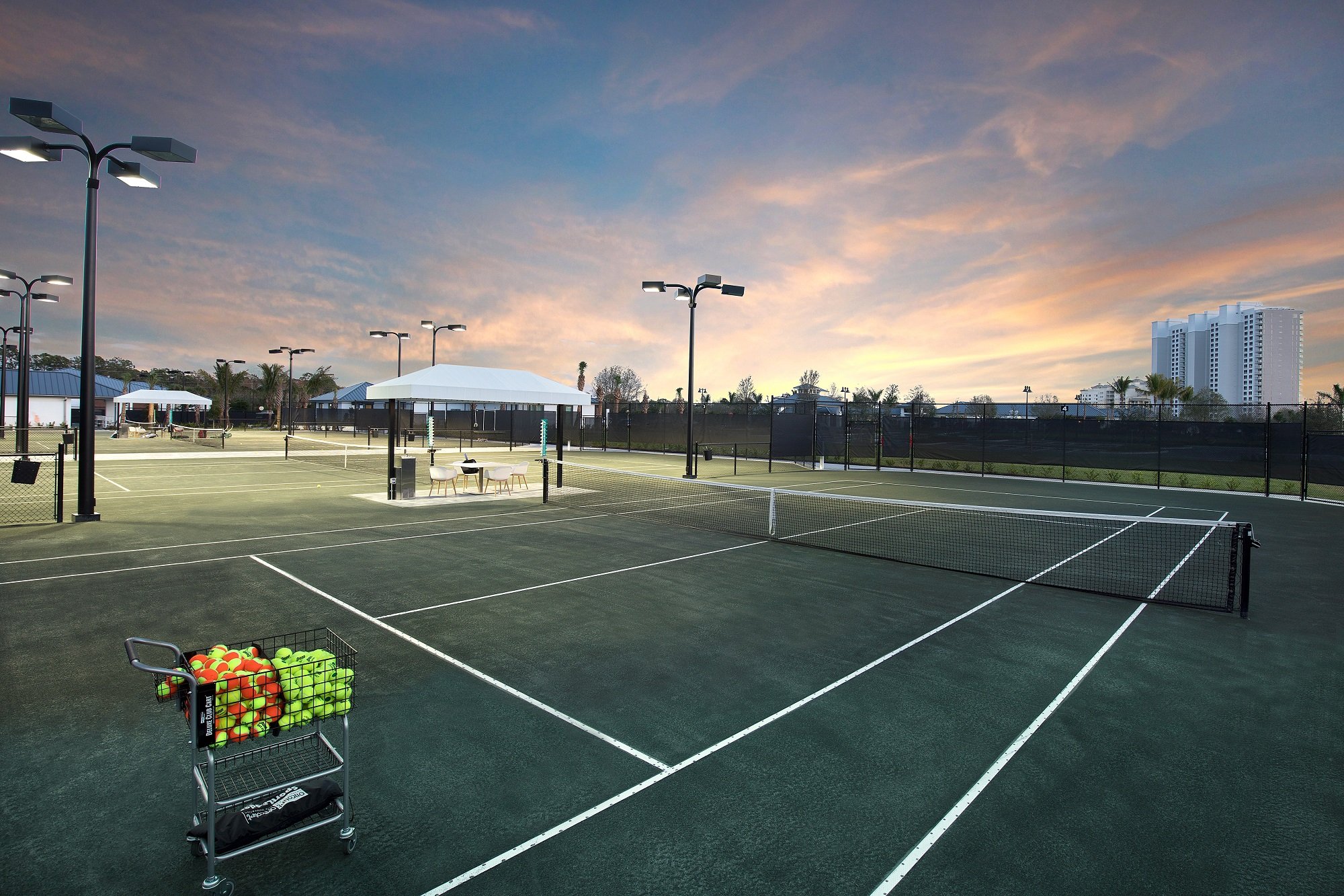 Tennis courts at dusk at Kalea Bay