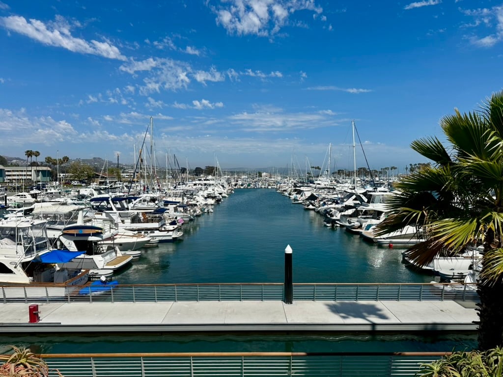 Shot between boats of dana point harbor after remodel of wharf