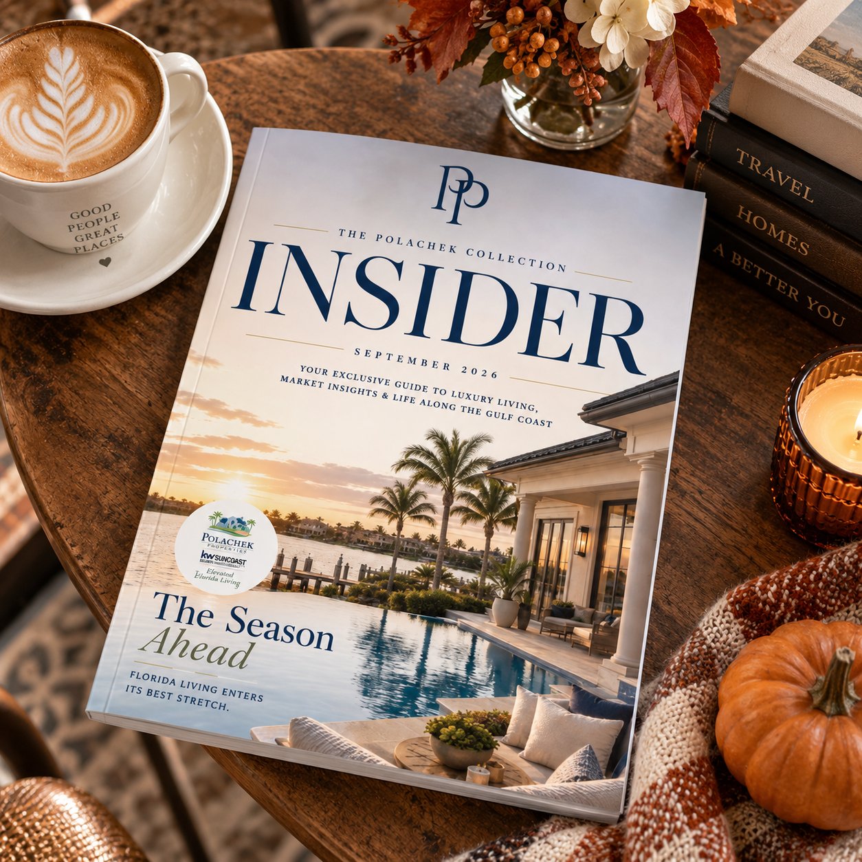 Polachek Collection Insider magazine on an autumn table with a latte, flowers, pumpkins, and a Gulf Coast home on its cover.