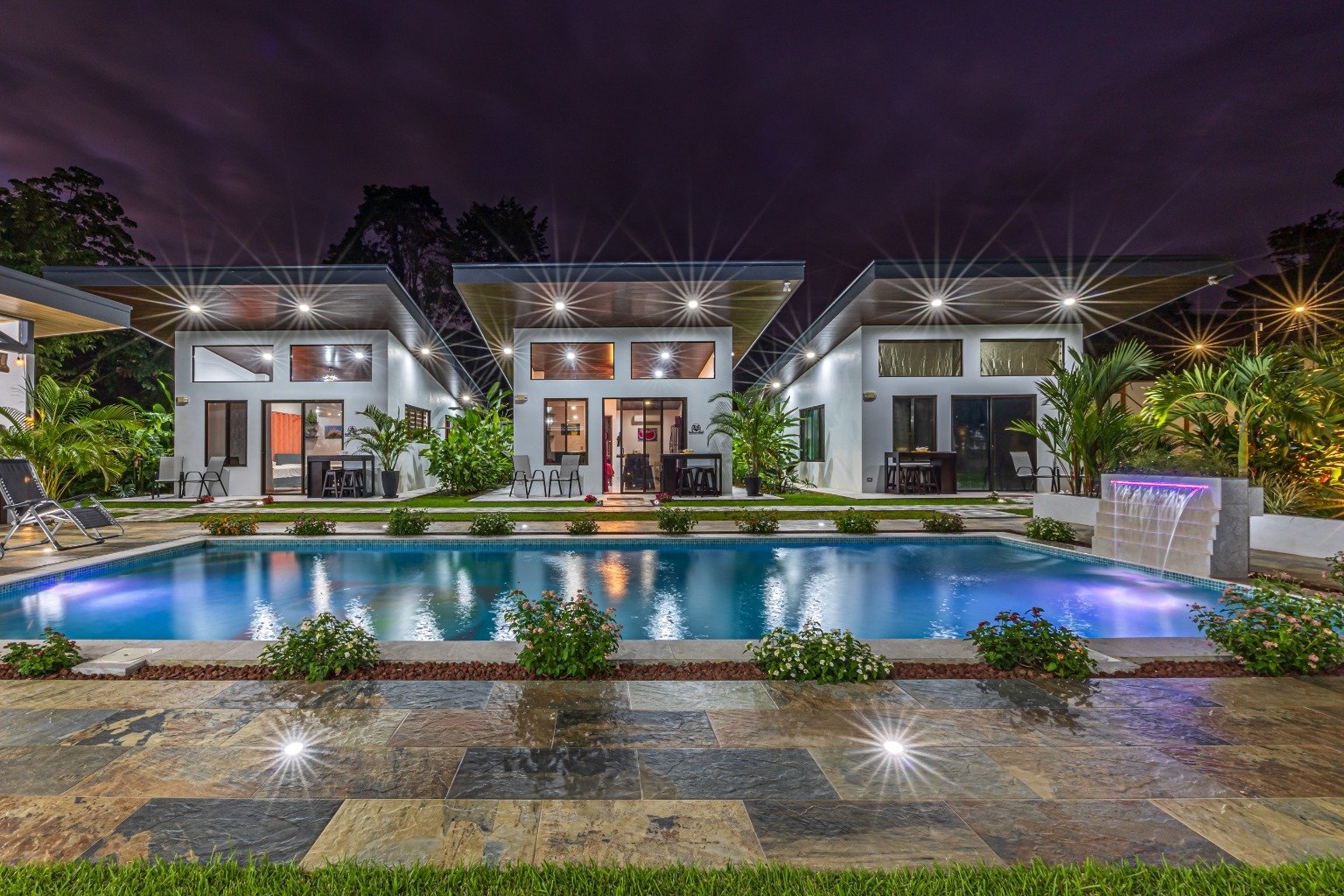 Incredible turnkey investment opportunity, 3 Rental villas, and a 2 Bedroom Home with a large pool.