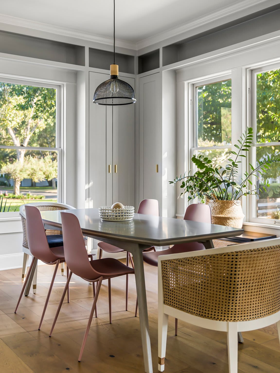 Dining nook with windows and pendant light at 1500 Northwood Rd, Pemberton Heights, Austin.