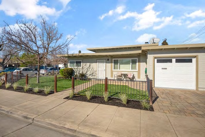 Fenced front yard and garage at 1401 and 1403 Cary Avenue, San Mateo
