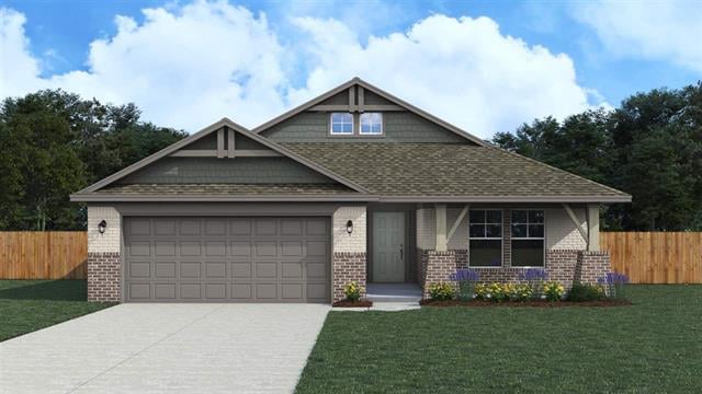 Gray single-story house with a two-car garage and covered front porch.