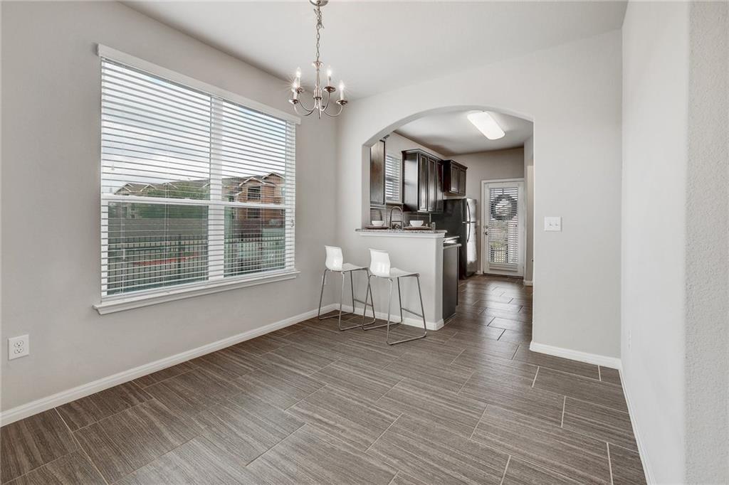 Modern Corner Lot Townhome in Coveted Carrington Court!