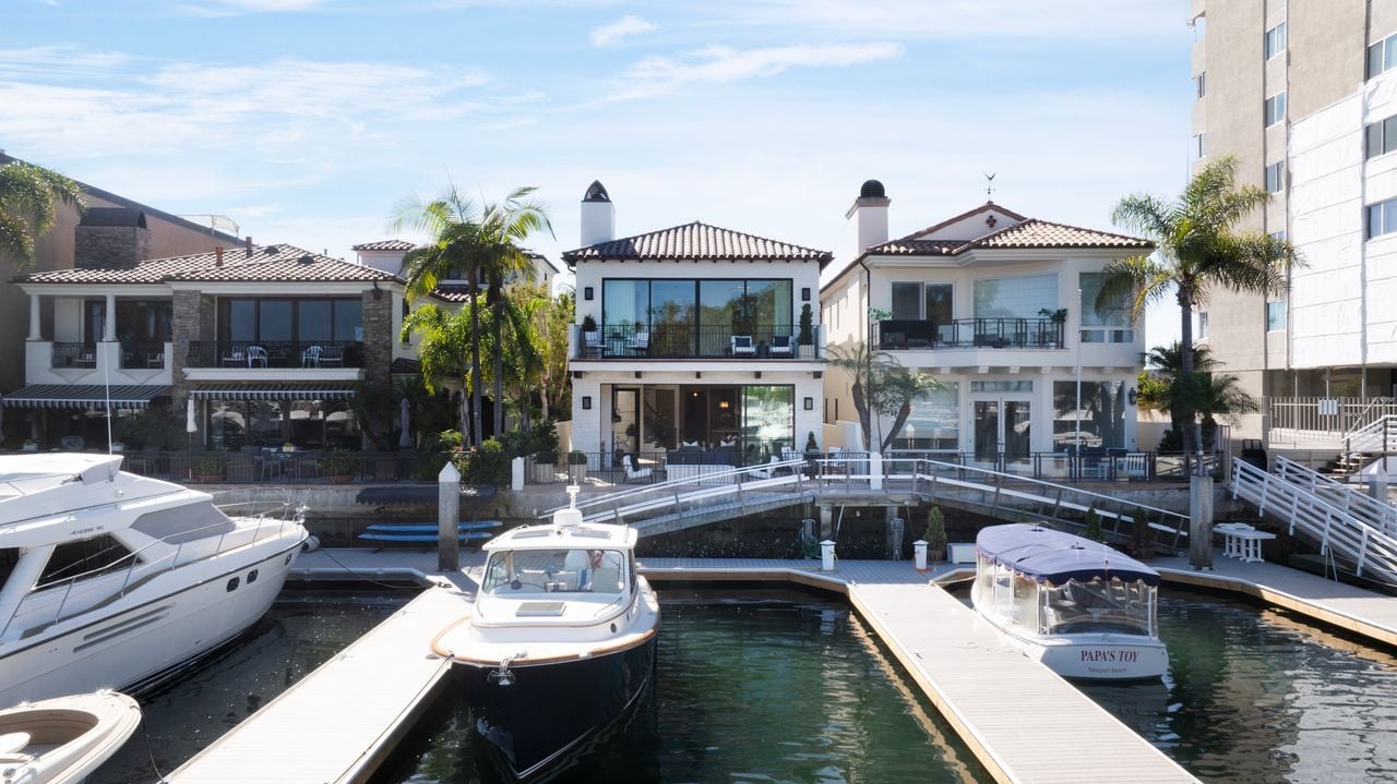 Experience the breathtaking beauty of Lido Village Waterfront's exterior! Discover a serene oasis by the water - the perfect blend of luxury and tranquility.