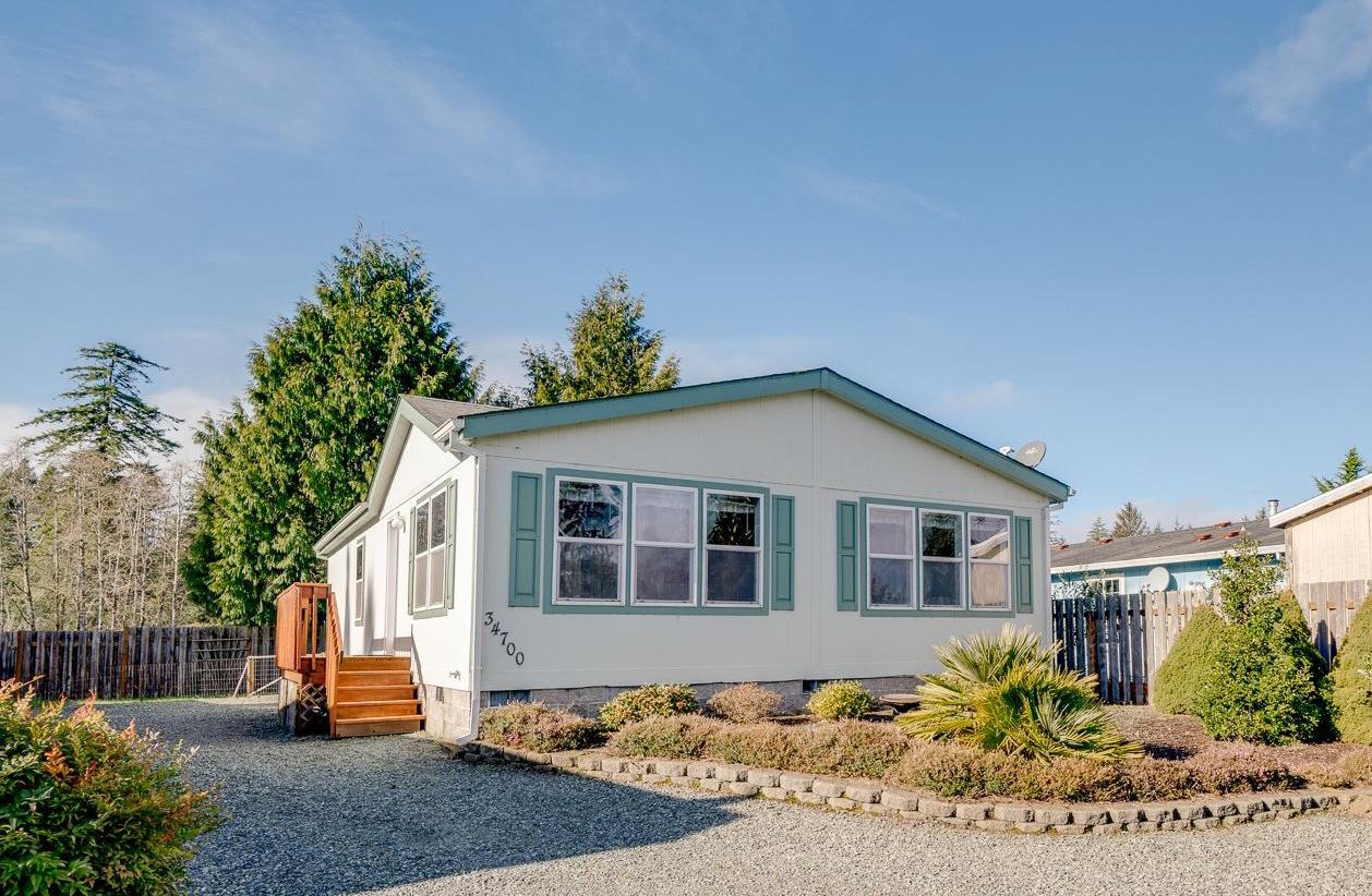 Sold Nehalem home at 34700 Neptune Ct represented by Erin Laskey of Home + Sea Realty with cul-de-sac setting and trees