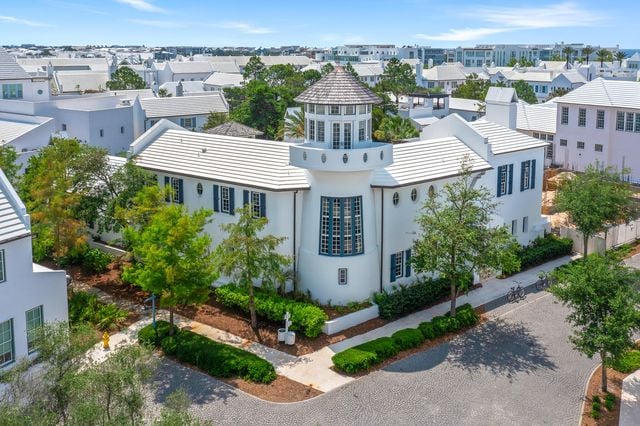 Alys Beach Florida white coastal homes, with courtyards and tree lined streets along 30A