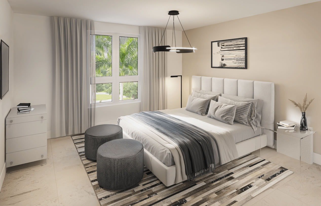 Staged bedroom with a white upholstered bed, striped rug, and palm views through the window.