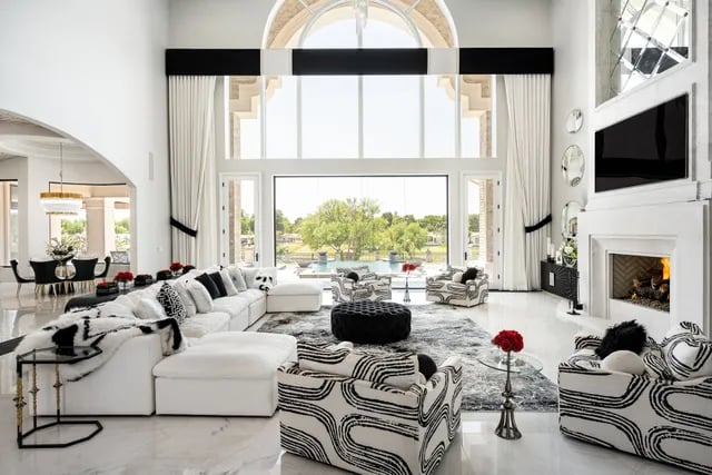 Luxury living room in Hartford County CT showcasing cohesive design, natural light, and strategic home preparation for selling in today’s real estate market