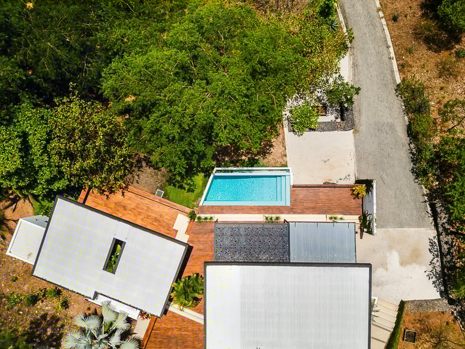 Casa Kalachuchi | Gorgeous Modern Jungle Oasis with Sunset Views in Gated Community