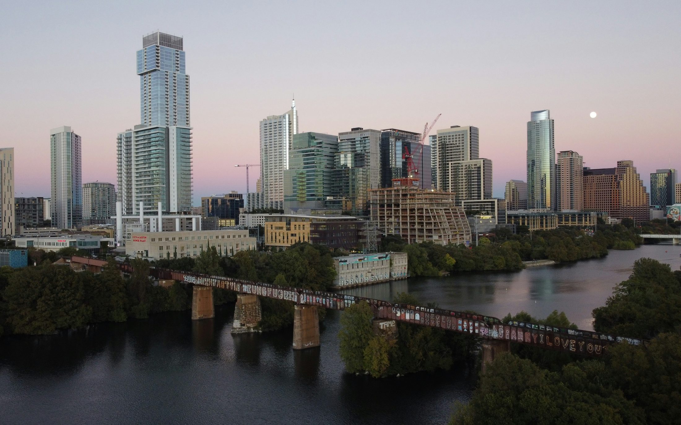 Austin skyline and riverfront at dusk.