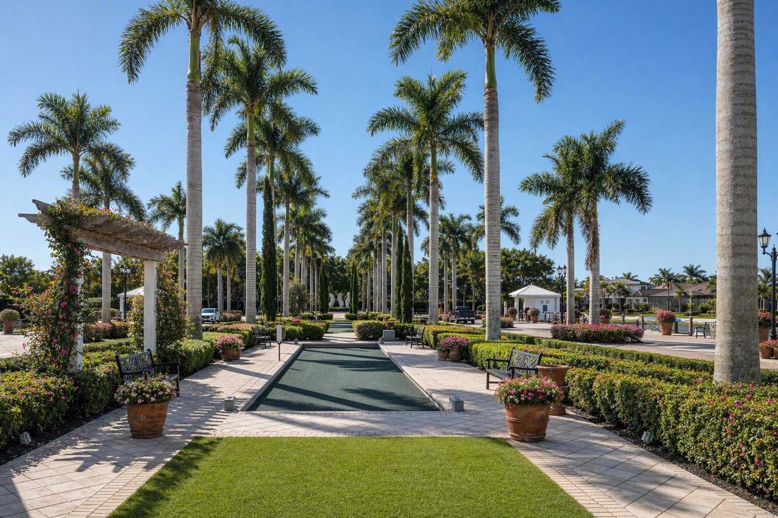Palm-lined walkway and fountain at Miromar Lakes Beach & Golf Club
