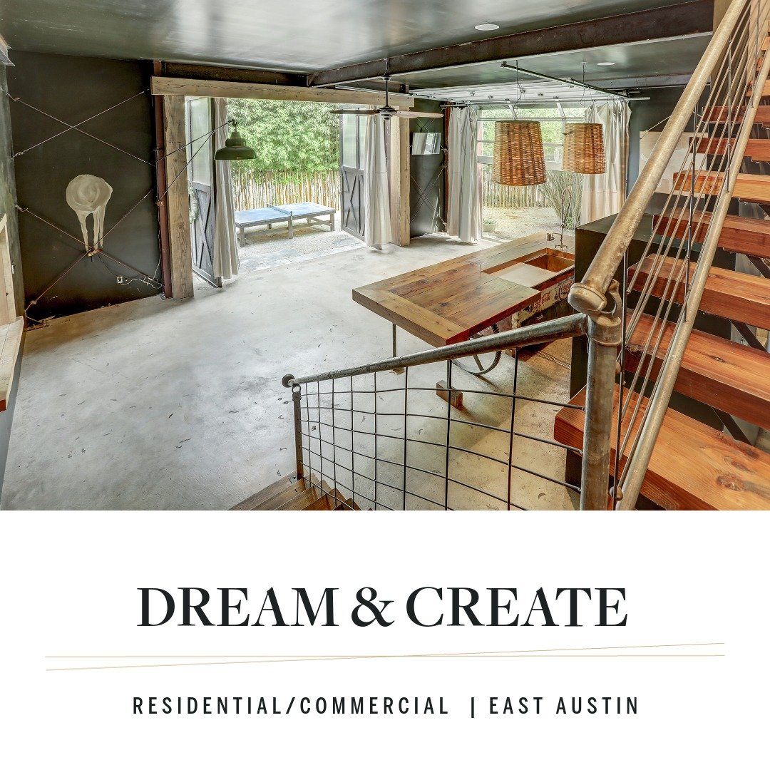 Floating wood stair with cable rail over concrete floors, overhead doors open to the courtyard at 640 Tillery Street, Austin 78702.