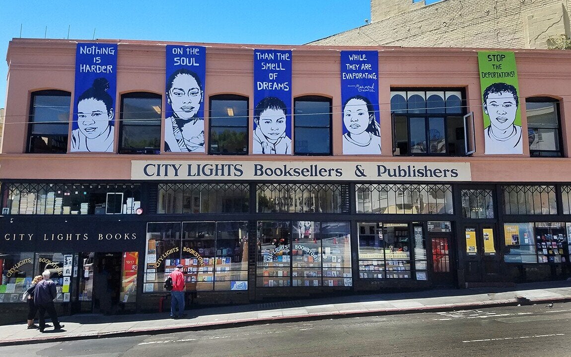 Exterior of City Lights Bookstore in San Francisco's North Beach, featuring its iconic signage and literary charm.