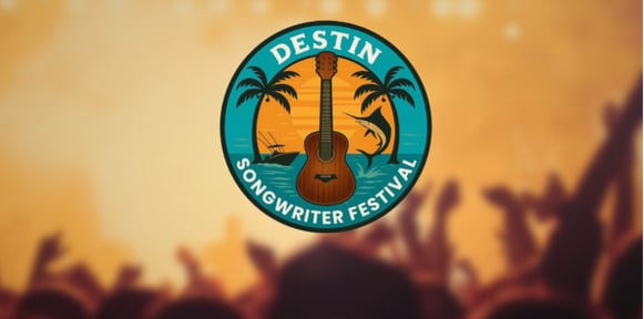 Destin Songwriter Festival emblem over an orange-lit concert crowd.