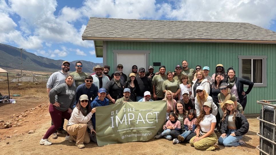 The Guzmán Ramos family in front of their newly built home in Ensenada, Baja California.