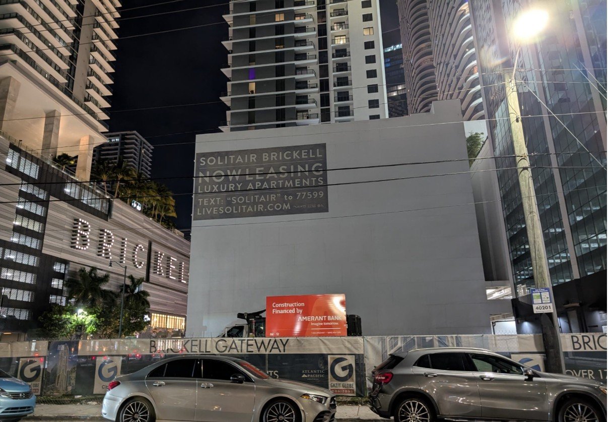 May 2025: Construction Financing Sign Posted at 61-Story Brickell Gateway Site