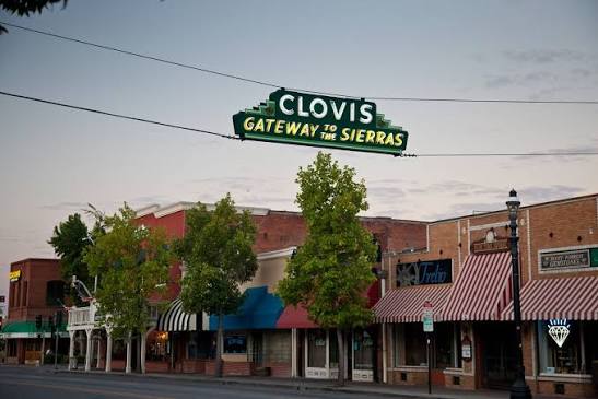 Historic downtown Old Town Clovis street with local shops and sunny sky