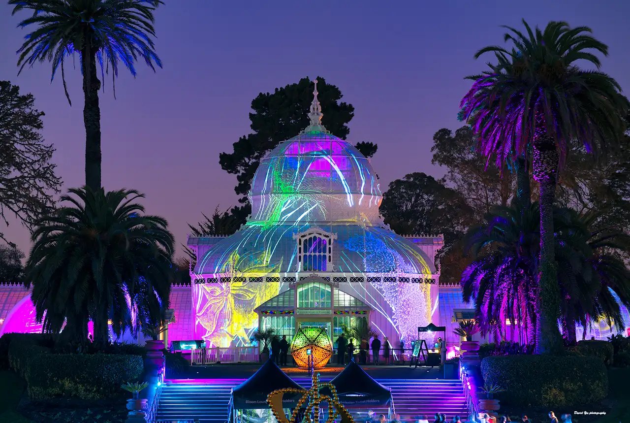 Wide shot of the conservatory with Golden Gate Park's landscape and other cultural attractions visible in the background