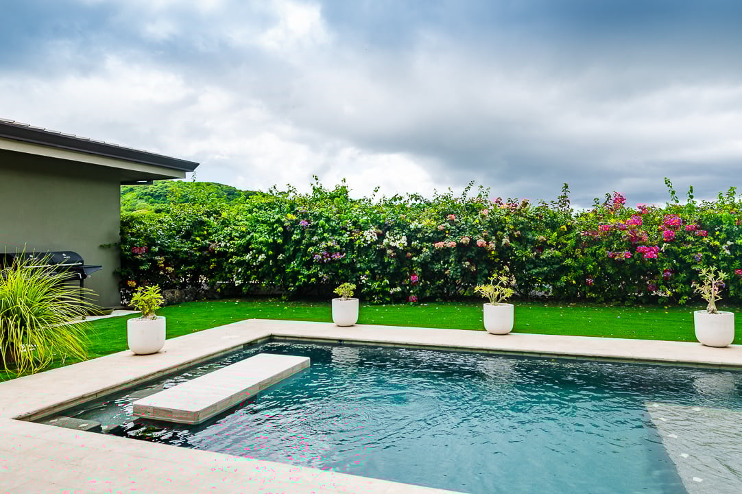 Casa Coralina | Elegant Home in Top Gated Community with Private Pool, Lush Gardens, & Incredible Amenities.  Located on a Double Lot w/ Ocean View!
