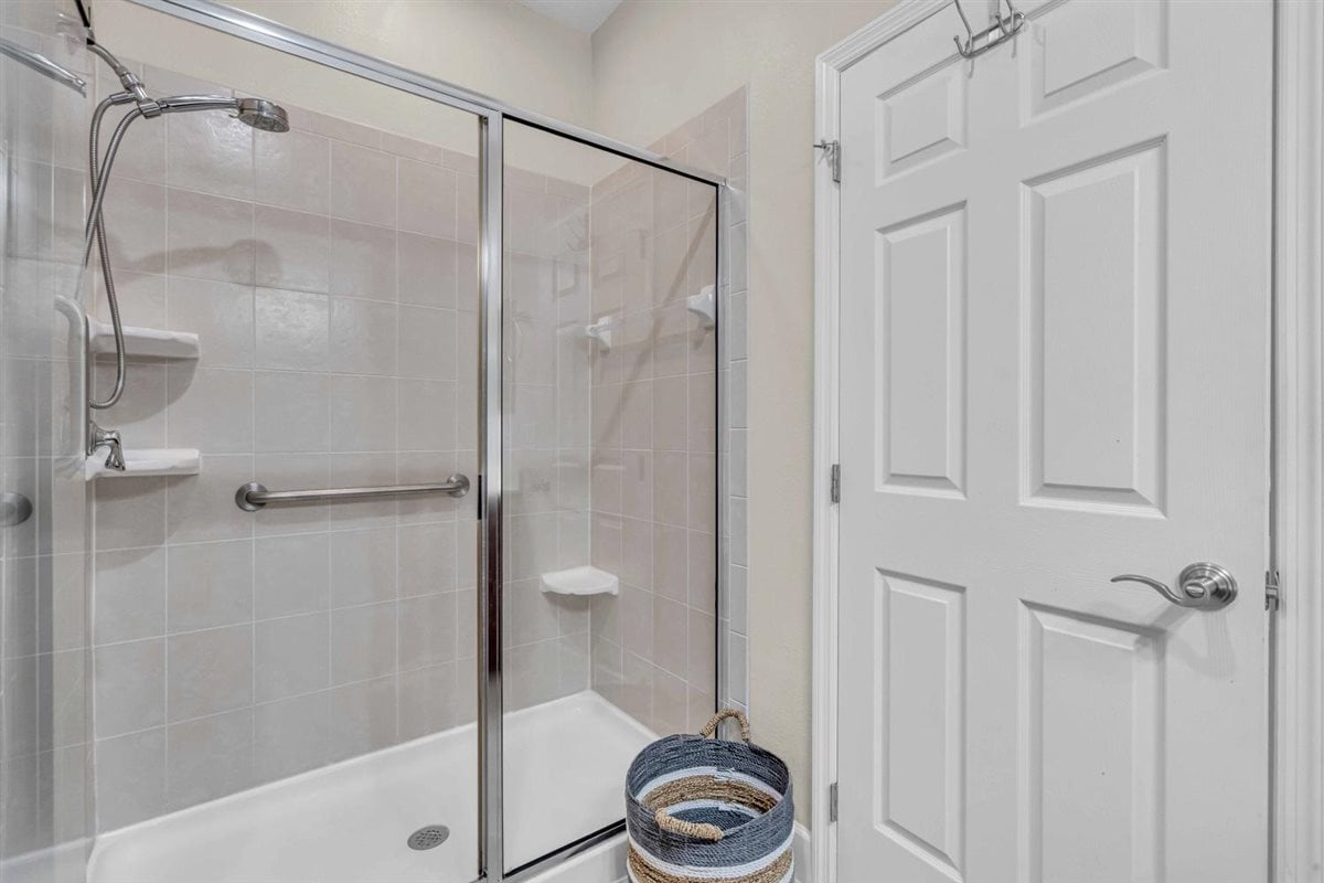 Walk-in Shower with sliding glass door